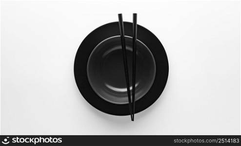top view chopsticks with dinnerware