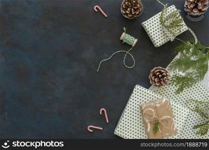 top view christmas gifts with pine cones copy space. Resolution and high quality beautiful photo. top view christmas gifts with pine cones copy space. High quality and resolution beautiful photo concept