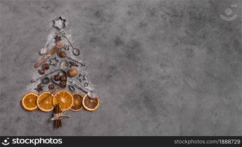 top view christmas tree shape made dried citrus kitchen utensils. Resolution and high quality beautiful photo. top view christmas tree shape made dried citrus kitchen utensils. High quality and resolution beautiful photo concept