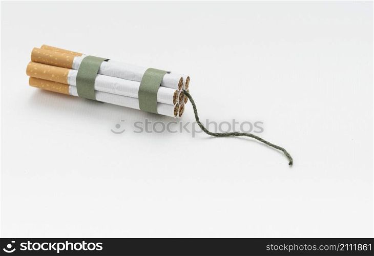 top view cigarette bundle wick against white background