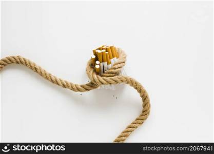 top view cigarettes tied by rope