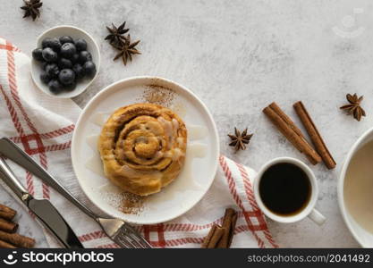 top view cinnamon roll blueberries