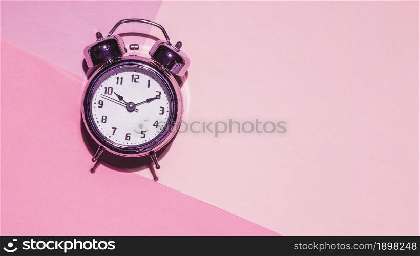 top view clock pink background. Resolution and high quality beautiful photo. top view clock pink background. High quality beautiful photo concept