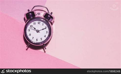 top view clock pink background. Resolution and high quality beautiful photo. top view clock pink background. High quality beautiful photo concept