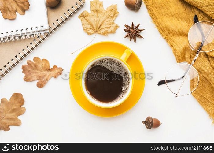 top view coffee cup with glasses autumn leaves
