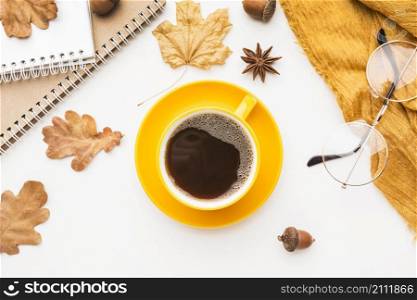 top view coffee cup with glasses autumn leaves