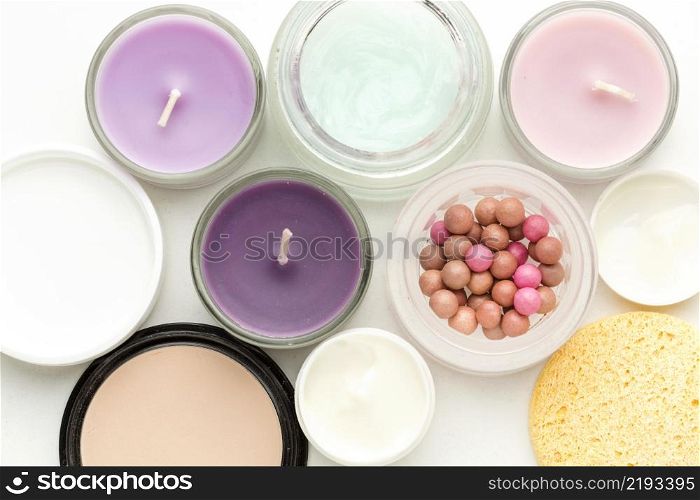 top view collection cosmetic products candles