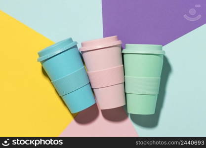 top view colored reusable cups table