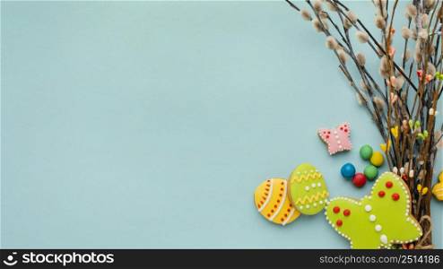 top view colorful easter eggs with twigs copy space