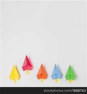top view colorful paper planes. Resolution and high quality beautiful photo. top view colorful paper planes. High quality and resolution beautiful photo concept