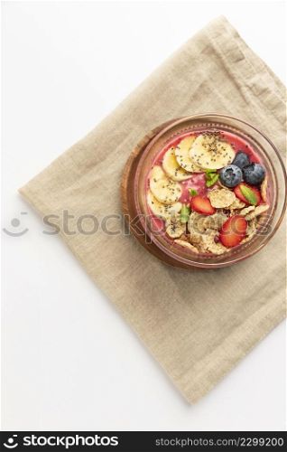 top view corn flakes bowl with strawberries blueberries