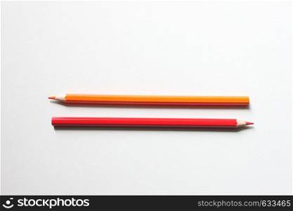 top view crayon is placed on a white background and have copy space in your work.