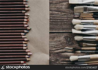 top view crayons brushes arrangement