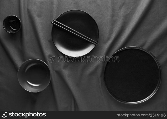 top view dark plates chopsticks