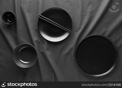 top view dark plates chopsticks