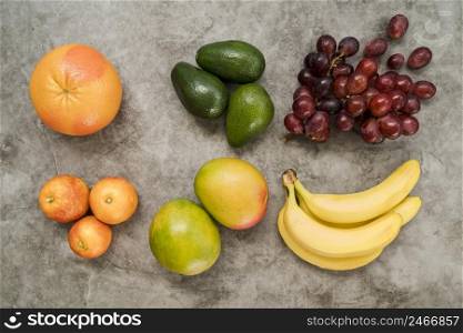 top view delicious assortment fruits table