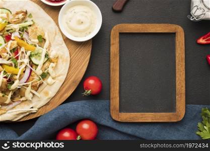 top view delicious kebab with frame tomatoes. High resolution photo. top view delicious kebab with frame tomatoes. High quality photo