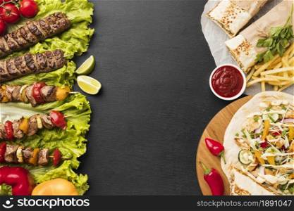 top view delicious kebab with french fries ketchup. Resolution and high quality beautiful photo. top view delicious kebab with french fries ketchup. High quality and resolution beautiful photo concept