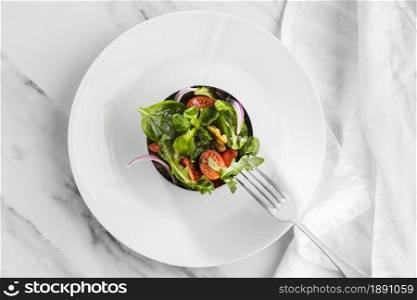 top view delicious salad white plate. Resolution and high quality beautiful photo. top view delicious salad white plate. High quality and resolution beautiful photo concept