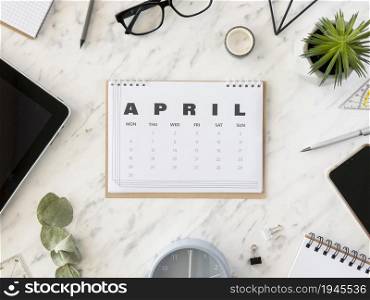 top view desk april calendar. High resolution photo. top view desk april calendar. High quality photo