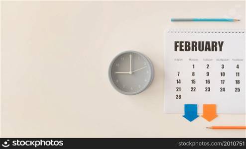 top view desk february calendar clock
