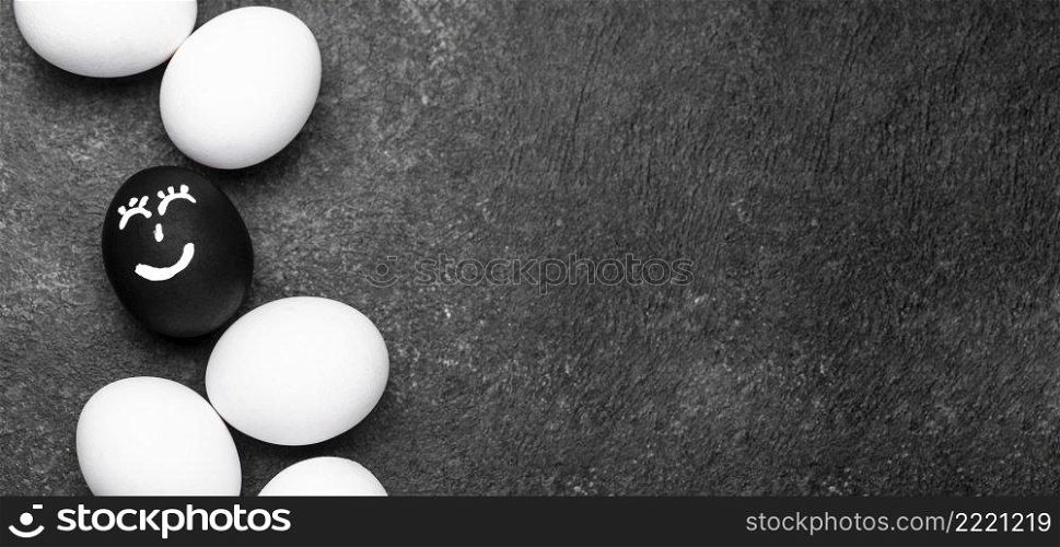 top view different colored eggs with faces black lives matter movement copy space