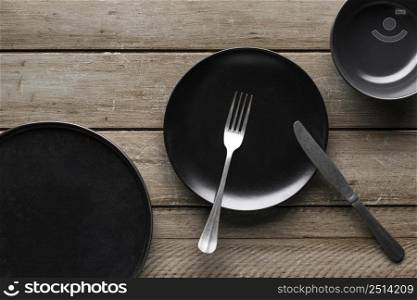 top view dishware with fork knife