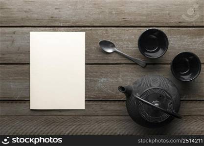 top view dishware with spoon teapot