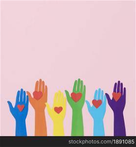 top view diversity composition different colored paper hands with copy space. Resolution and high quality beautiful photo. top view diversity composition different colored paper hands with copy space. High quality and resolution beautiful photo concept