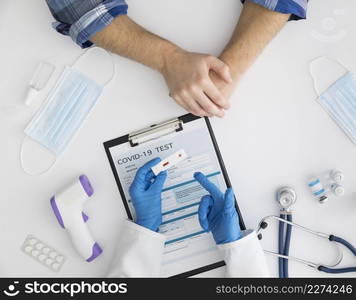 top view doctor checking covid test3. Resolution and high quality beautiful photo. top view doctor checking covid test3. High quality beautiful photo concept