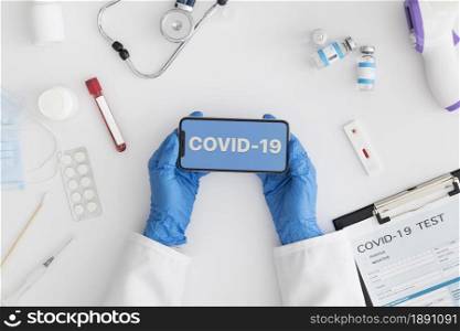 top view doctor holding a mobile phone. Resolution and high quality beautiful photo. top view doctor holding a mobile phone. High quality and resolution beautiful photo concept