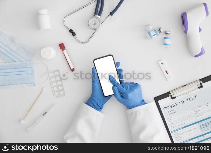top view doctor holding mobile phone. Resolution and high quality beautiful photo. top view doctor holding mobile phone. High quality and resolution beautiful photo concept