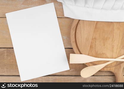 top view empty menu paper with wooden spoons