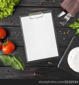 top view empty menu with tomatoes spinach