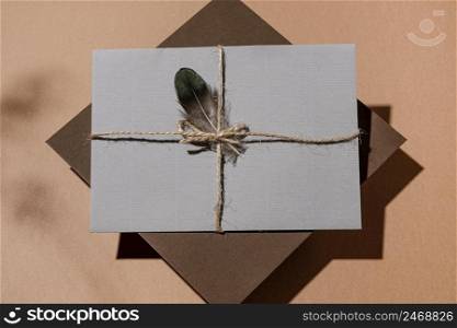 top view envelope with string feather