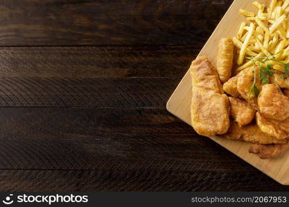 top view fish chips chopping board with copy space