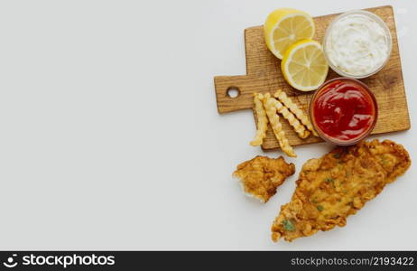 top view fish chips with ketchup copy space