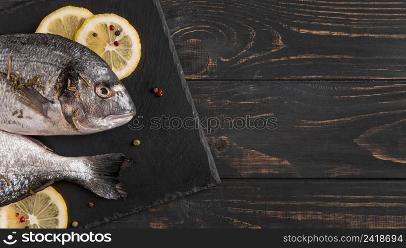 top view fish slices lemon