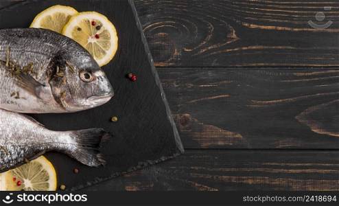 top view fish slices lemon