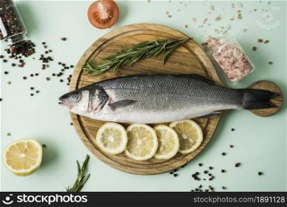top view fish with herbs lemon. Resolution and high quality beautiful photo. top view fish with herbs lemon. High quality and resolution beautiful photo concept