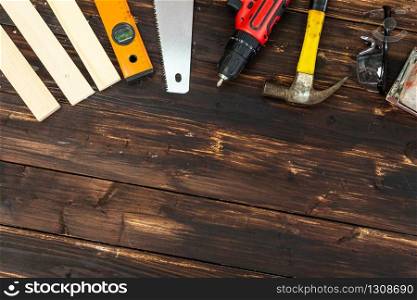 Top view flat lay of tools for handyman and carpenter. Woodwork hobby and DIY concept.