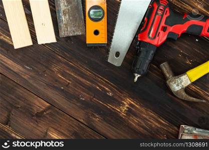 Top view flat lay of tools for handyman and carpenter. Woodwork hobby and DIY concept.
