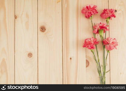 top view flowers wooden background with copy space. High resolution photo. top view flowers wooden background with copy space. High quality photo