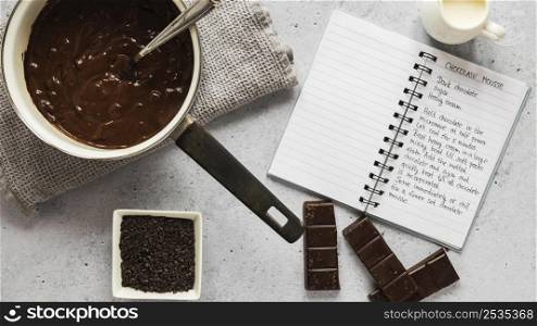 top view food ingredients with chocolate notebook
