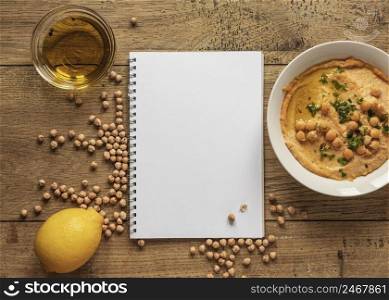 top view food ingredients with notebook chickpeas
