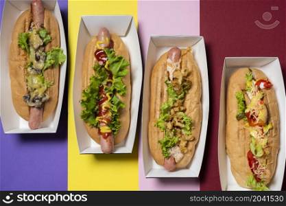 top view four different filling hot dogs