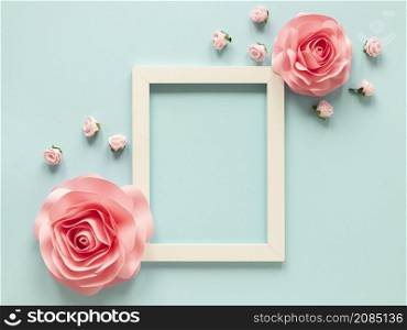 top view frame with paper flowers women s day