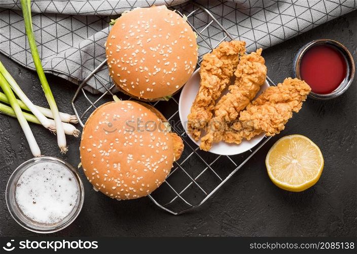 top view fried chicken burgers tray with sauces