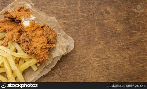 top view fried chicken fries with copy space. Resolution and high quality beautiful photo. top view fried chicken fries with copy space. High quality beautiful photo concept