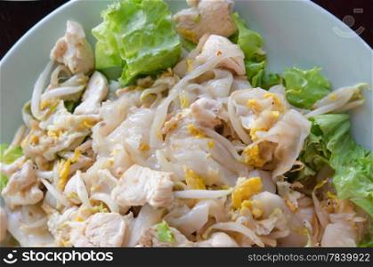 Top view Fried Noodles with chicken , egg and vegetable